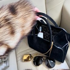 Maison Crivelli perfume in Rosie Huntington-Whiteley's bag