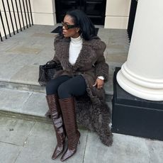 @nlmarilyn in a shearling coat and Bottega Veneta Andiamo Bag