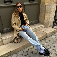 Fashion influencer @annelauremais in Europe wearing an anti-trend outfit styled with winter wardrobe staples.