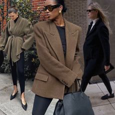 Fashion influencers @nlmarilyn, @lindatol_, and @cocoschiffer wearing chic winter outfits styled with the black stirrup leggings trend.